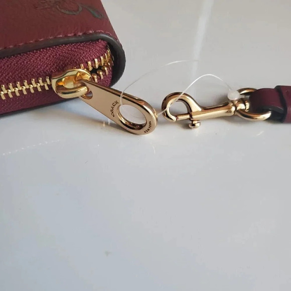 Coach Long Zip Around Wallet With Holiday Bells Print – Club  Coach Long Zip Around Wallet With Holiday Bells Print